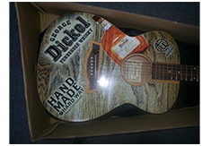 Guitar wrap by Custom Graphics and Signs