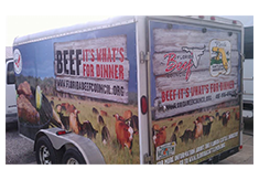 Full trailer wrap designed by Custom Graphics and Signs