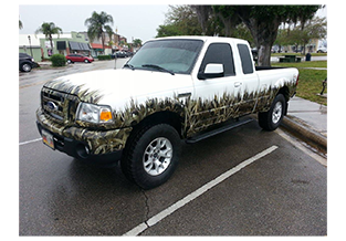 Truck wrap, pickup truck camo wrap designed by Custom Graphics and Signs, Florida