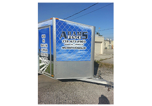 Full trailer wrap front view designed by Custom Graphics and Signs