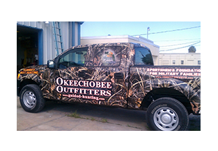 Full pickup truck wrap by Custom Graphics and Signs