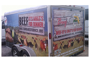 Full trailer wrap by Custom Graphics and Signs